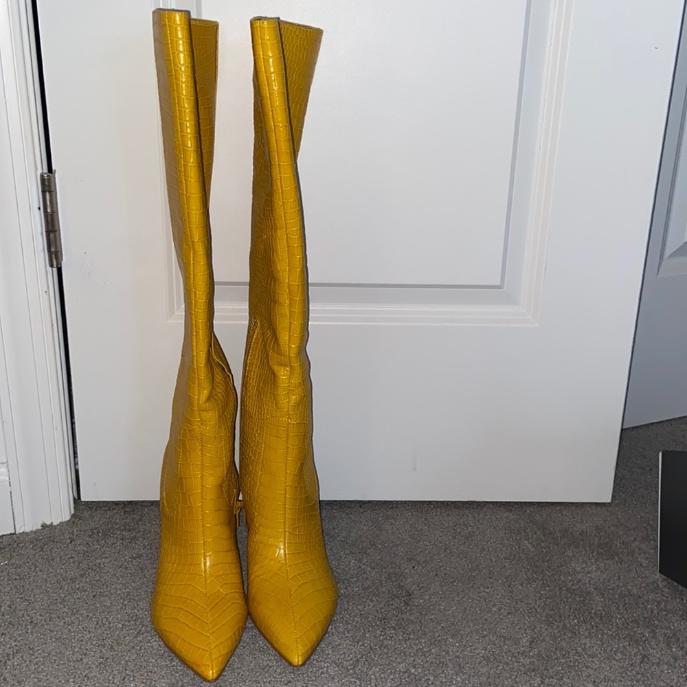 Brand new nine W. 9 1/2 yellow boots